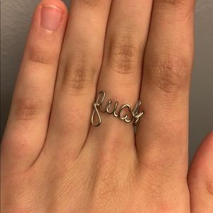Ring that says “Fuck”
